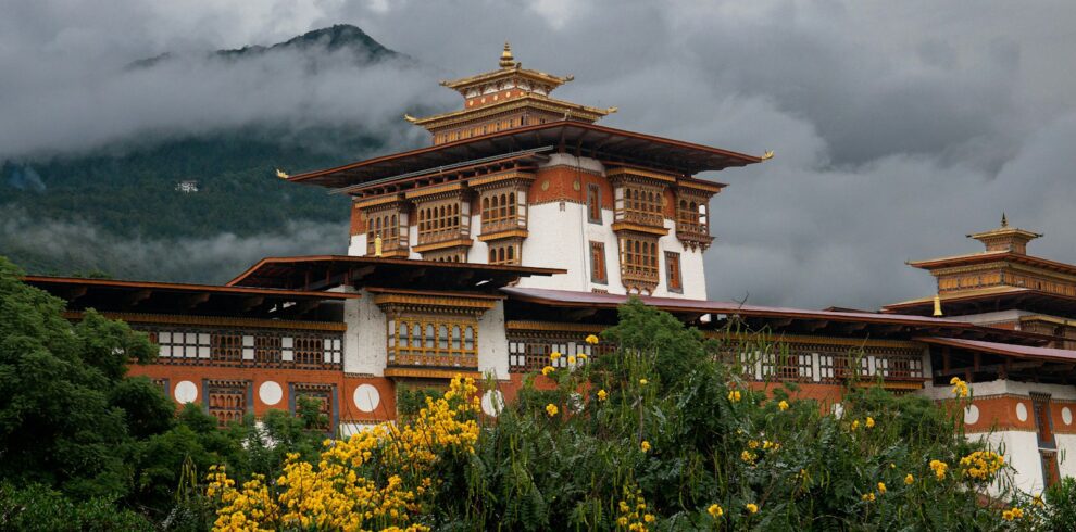 A building with a mountain in the background