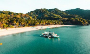 a boat in the middle of a body of water