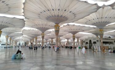 people walking inside white building