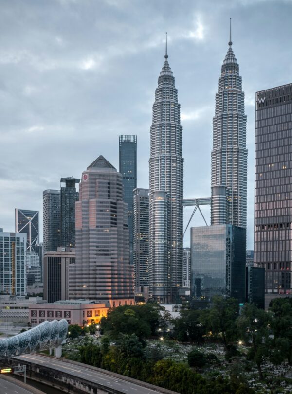 city buildings under white cloudy sky during daytime