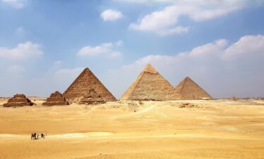 brown pyramid under blue sky during daytime