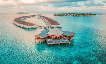 aerial photography of resort rooms and island