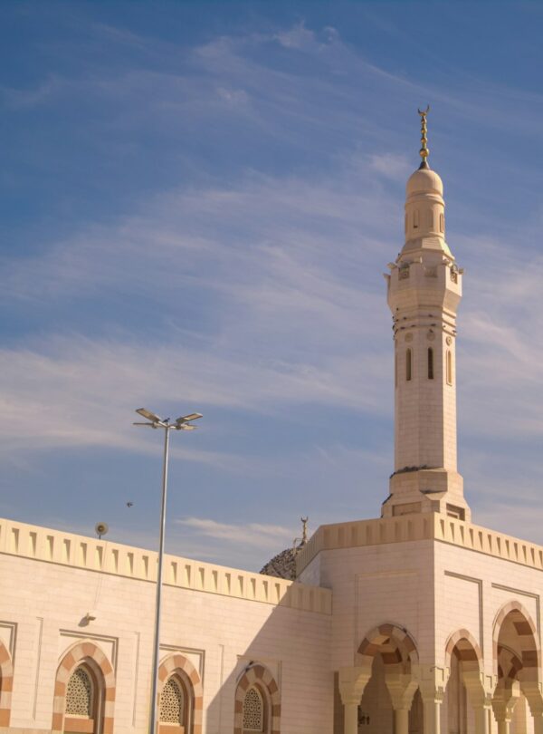 A large white building with a clock tower